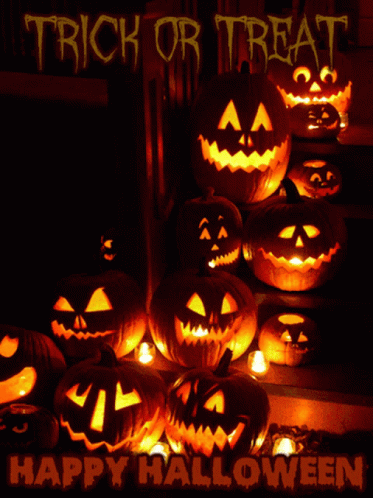 A Group Of Pumpkins With The Words Trick Or Treat Happy Halloween On The Bottom GIF