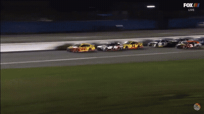 A Group Of Race Cars Are Racing On A Track Sponsored By Fox Live GIF