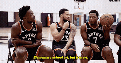 A Group Of Raptors Basketball Players Sitting In Chairs GIF