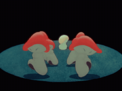 A Group Of Red And White Mushrooms Are Standing In A Circle On A Blue Surface GIF