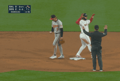 A Group Of Red Sox Baseball Players Standing In The Dugout GIF