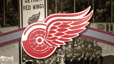 A Group Of Red Wings Players Pose For A Picture GIF