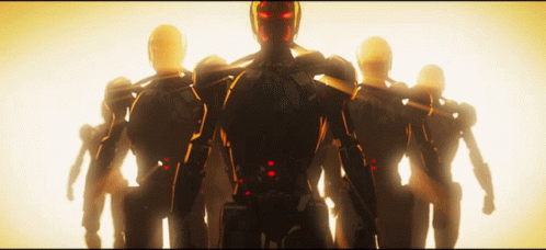 A Group Of Robots Are Standing In A Row And One Has Red Eyes GIF