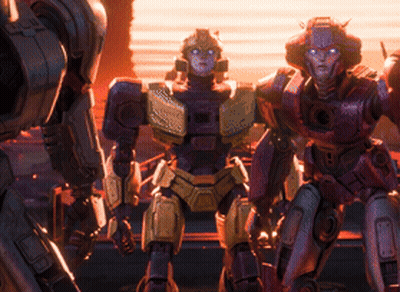 A Group Of Robots Are Standing Next To Each Other And One Of Them Has A Red Head GIF