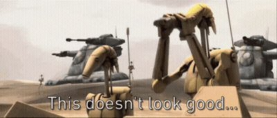 A Group Of Robots Standing Next To Each Other With The Words " This Does N't Look Good " Above Them GIF