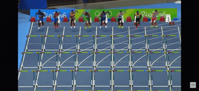A Group Of Runners On A Track With Rio 2016 Written On The Wall Behind Them GIF