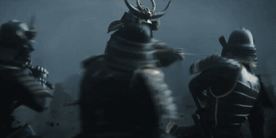 A Group Of Samurai In Armor Are Standing In The Dark GIF