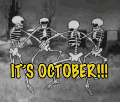 A Group Of Skeletons Are Dancing In A Cemetery With The Words It 'S October !!! Above Them GIF