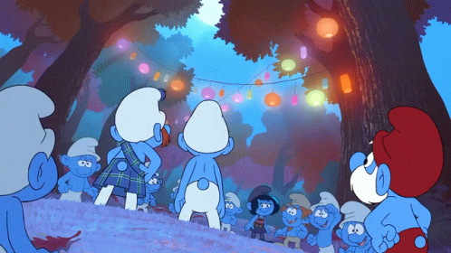A Group Of Smurfs Are Gathered In A Forest GIF