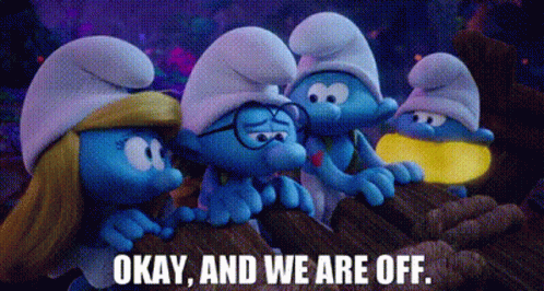 A Group Of Smurfs Are Standing Next To Each Other On Top Of A Rock . GIF