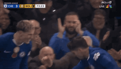 A Group Of Soccer Players Are Celebrating A Goal Against Wolves GIF