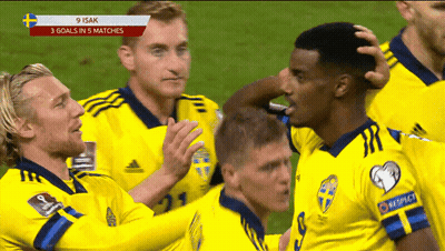 A Group Of Soccer Players Are Celebrating A Goal With The Headline 9 Isak GIF