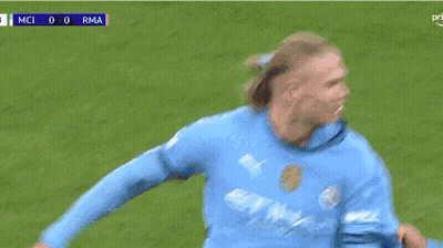 A Group Of Soccer Players Are Celebrating A Goal With The Score Of 1-0 GIF