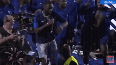 A Group Of Soccer Players Are Dancing In Front Of A Sign That Says Brian On It GIF