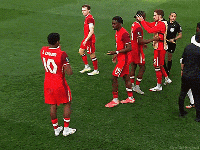 A Group Of Soccer Players Are On A Field And One Has The Number 8 On His Back GIF