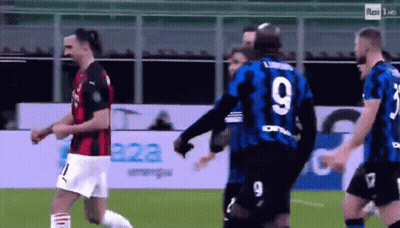 A Group Of Soccer Players Are On A Field And One Of Them Has The Number 9 On His Jersey GIF