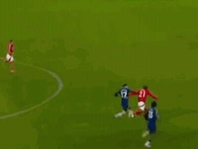 A Group Of Soccer Players Are Playing A Game Of Soccer On A Field . GIF