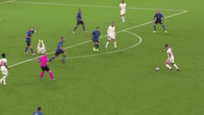 A Group Of Soccer Players Are Playing A Game Of Soccer On A Soccer Field . GIF