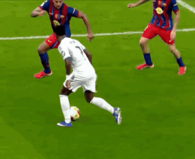 A Group Of Soccer Players Are Playing A Game On A Field GIF