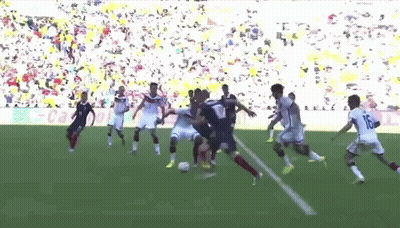 A Group Of Soccer Players Are Playing On A Field And One Of Them Has The Number 16 On His Jersey GIF