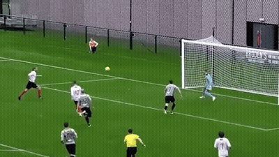 A Group Of Soccer Players Are Playing On A Field And One Of Them Has The Number 32 On His Jersey GIF