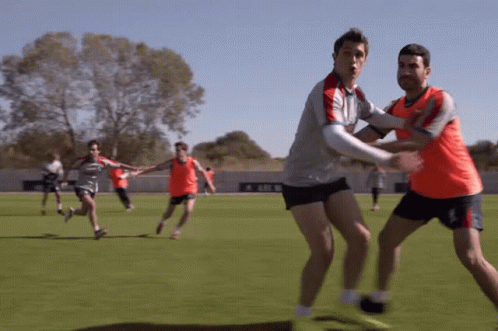 A Group Of Soccer Players Are Playing On A Field And One Of Them Is Wearing A Shirt That Says Adidas On It GIF