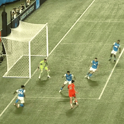 A Group Of Soccer Players Are Playing On A Field That Has A Sign That Says Shop Now GIF