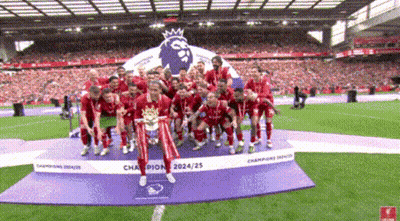A Group Of Soccer Players Are Posing For A Picture On A Field GIF