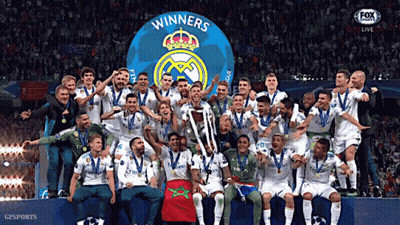 A Group Of Soccer Players Are Posing For A Picture With A Trophy That Says Winners On It GIF