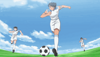 A Group Of Soccer Players Are Running Towards The Ball GIF