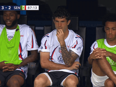 A Group Of Soccer Players Are Sitting In The Dugout With The Score 3-2 Sen GIF