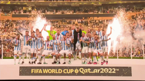 A Group Of Soccer Players Are Standing In Front Of A Sign That Says Fifa World Cup Qatar2022 GIF