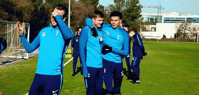 A Group Of Soccer Players Are Standing On A Field And One Of Them Has The Number 16 On His Jersey GIF