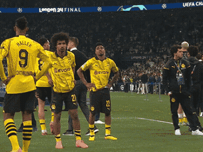 A Group Of Soccer Players Are Standing On A Field And One Of Them Has The Number 9 On His Shirt GIF