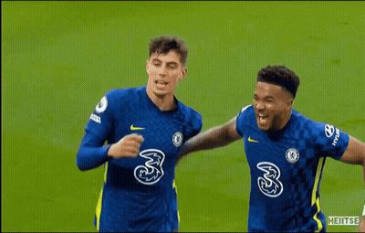 A Group Of Soccer Players Are Standing On A Field And One Of Them Is Wearing A Number 24 Jersey . GIF