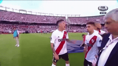 A Group Of Soccer Players Are Standing On A Field With A Fox Sports Logo In The Background GIF