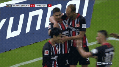 A Group Of Soccer Players Celebrate A Goal Against Frankfurt GIF