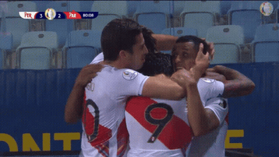 A Group Of Soccer Players Hugging Each Other With The Number 9 On The Back Of Their Jersey GIF
