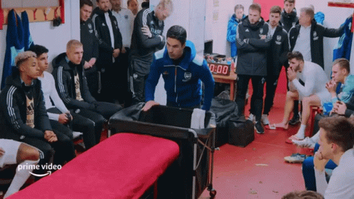 A Group Of Soccer Players In A Locker Room With The Word Prime Video On The Bottom Right Corner GIF