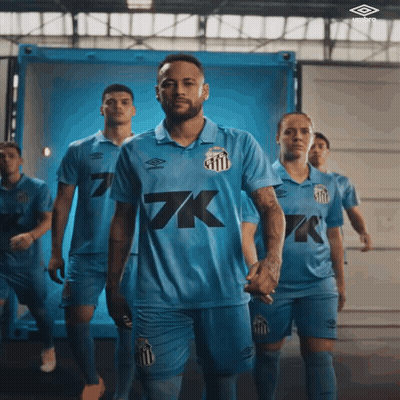 A Group Of Soccer Players In Blue Uniforms With 7K On The Front GIF