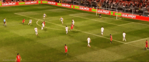 A Group Of Soccer Players On A Field With A Banner That Says Compre Produtos Oficial GIF