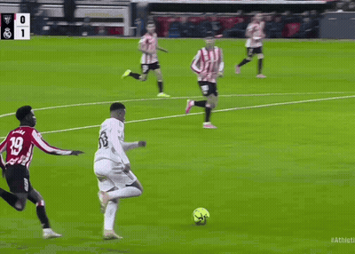 A Group Of Soccer Players On A Field With One Wearing A Number 18 Jersey GIF