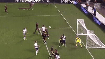 A Group Of Soccer Players On A Field With One Wearing The Number 2 Jersey GIF