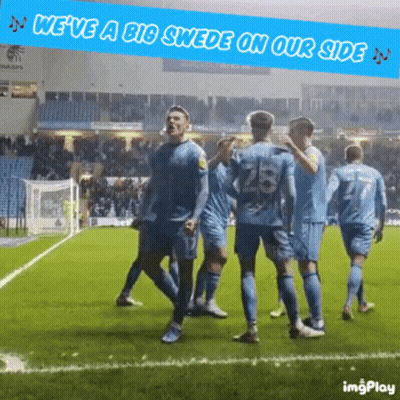 A Group Of Soccer Players On A Field With The Words " We 'Ve A Big Swede On Our Side " Above Them GIF