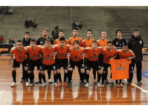 A Group Of Soccer Players Pose For A Photo With A Shirt That Says Tramontina On It Sticker