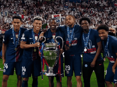 A Group Of Soccer Players Posing For A Picture With The Trophy GIF