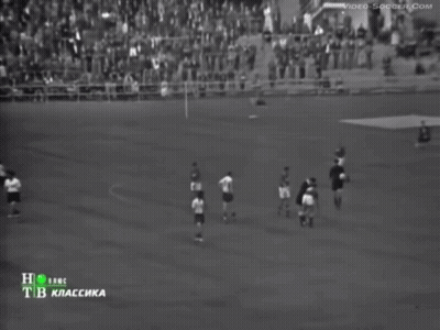A Group Of Soccer Players Standing On A Field With The Number 4 On Their Jersey GIF