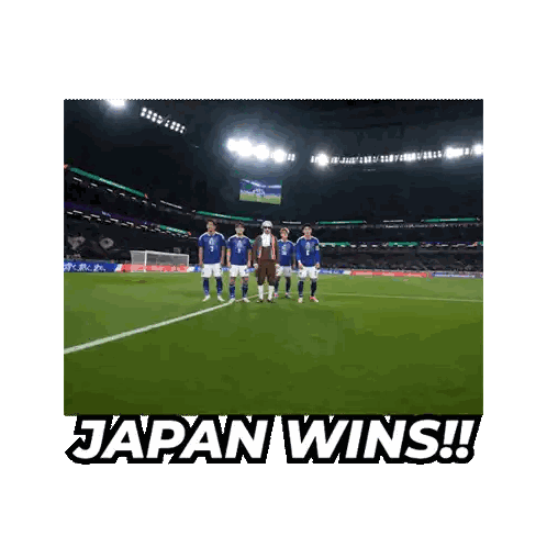 A Group Of Soccer Players Standing On A Soccer Field With The Words Japan Wins Below Them Sticker