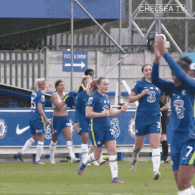 A Group Of Soccer Players Wearing Blue Jerseys With The Number Three On Them GIF