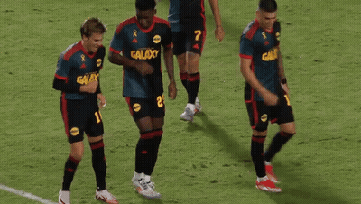A Group Of Soccer Players Wearing Galaxy Uniforms GIF